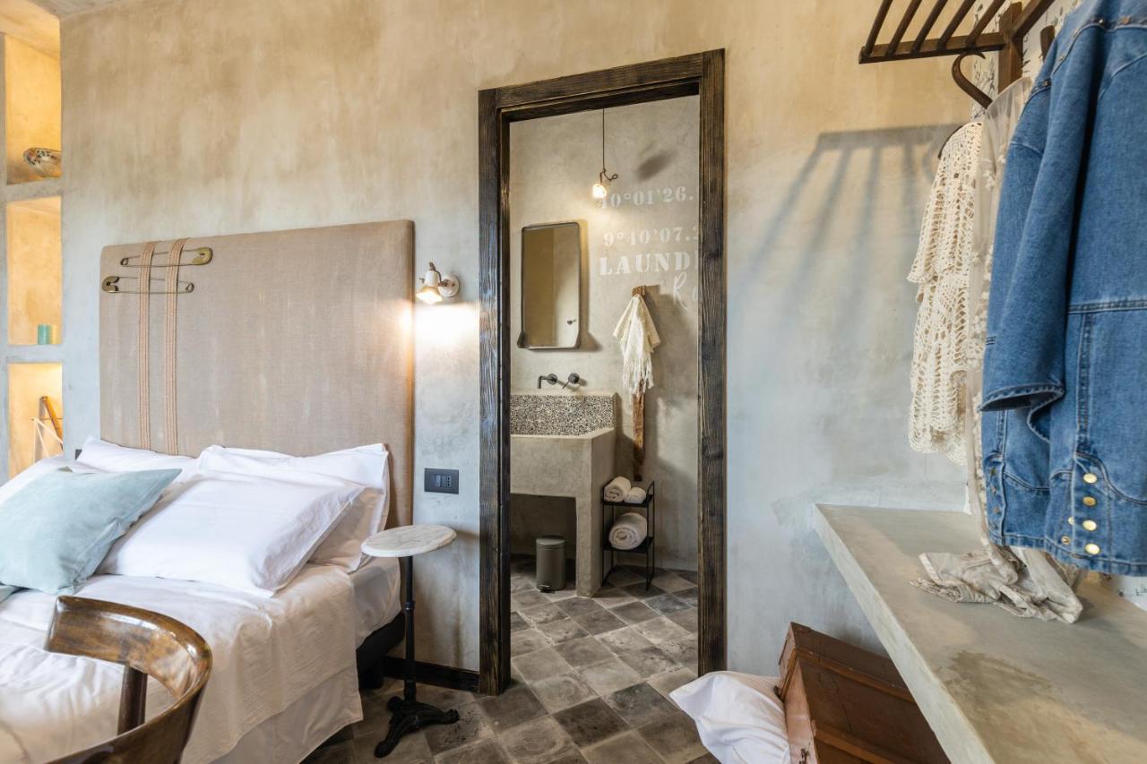 Via Roma Charming Rooms Baunei Bagian luar foto