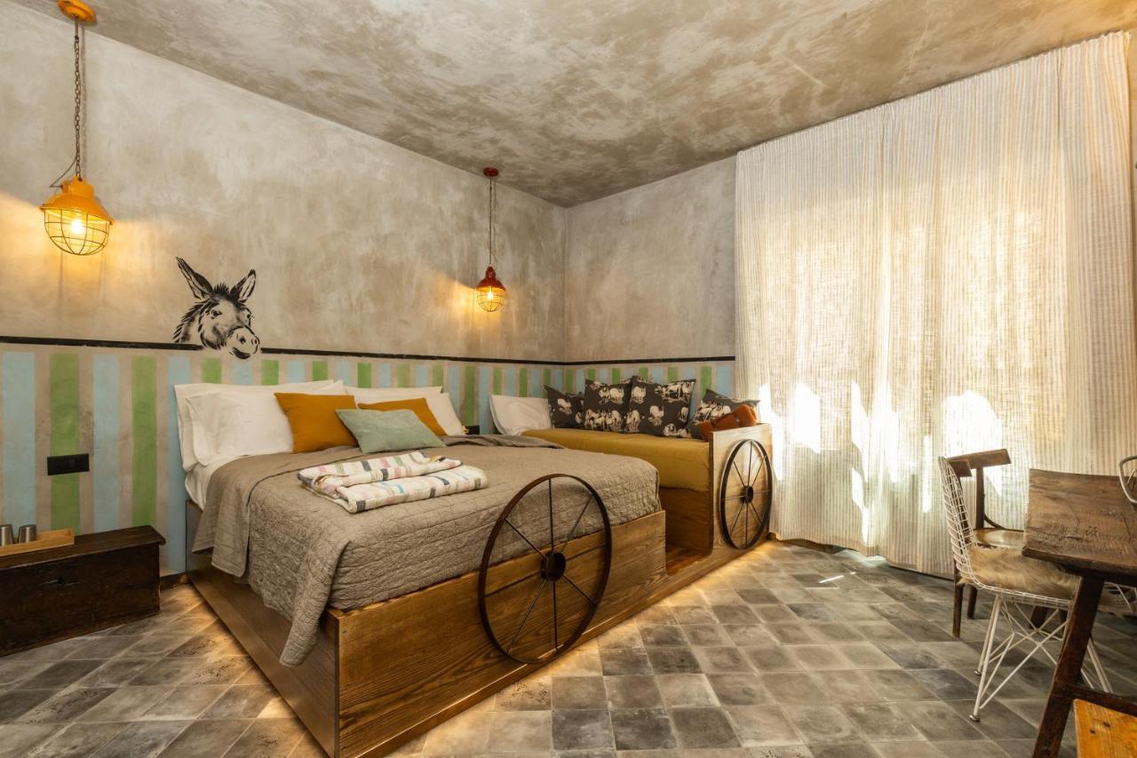 Via Roma Charming Rooms Baunei Bagian luar foto