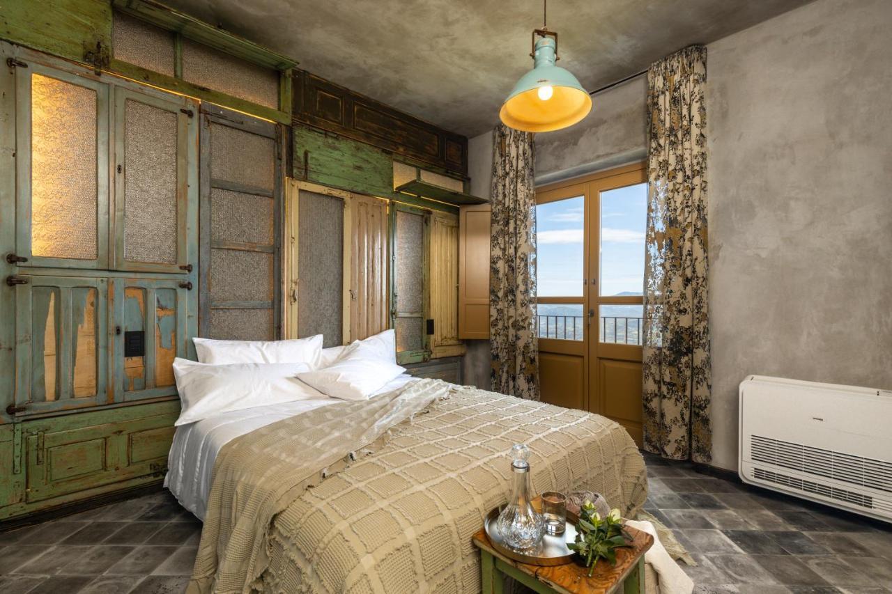 Via Roma Charming Rooms Baunei Bagian luar foto